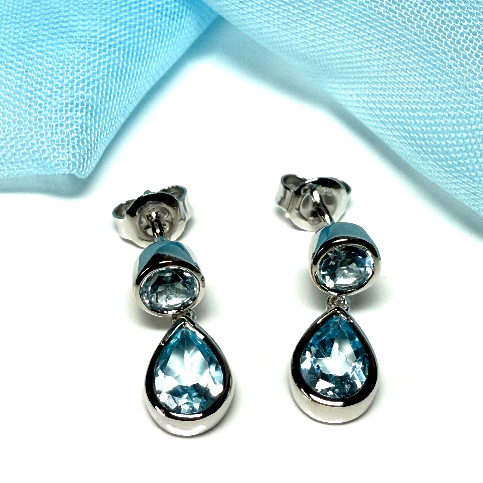 Real blue topaz double drop earrings sterling silver rubbed over