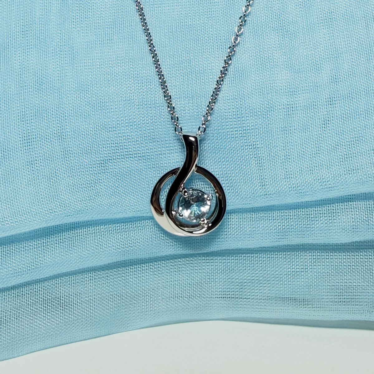 Real blue topaz necklace fancy round twisted swirl design