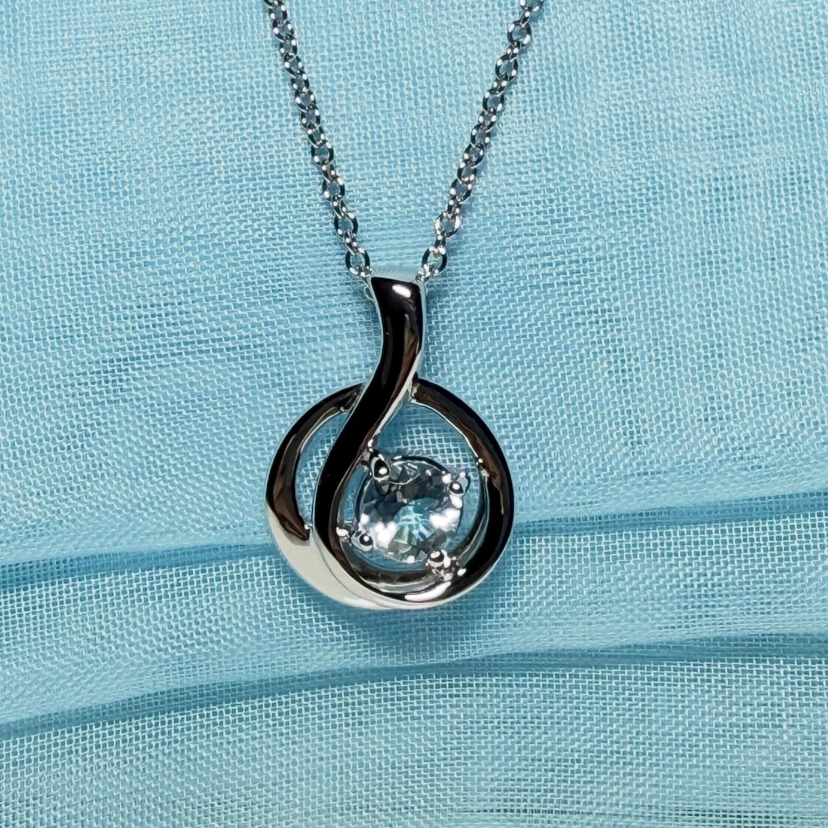 Real blue topaz necklace fancy round twisted swirl design
