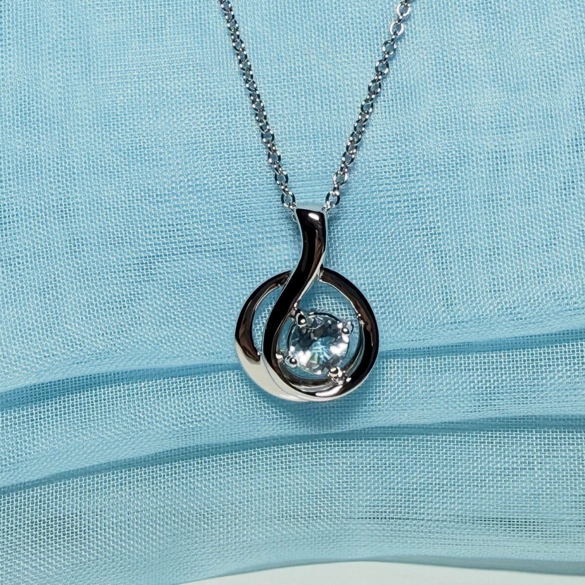 Real blue topaz necklace fancy round twisted swirl design