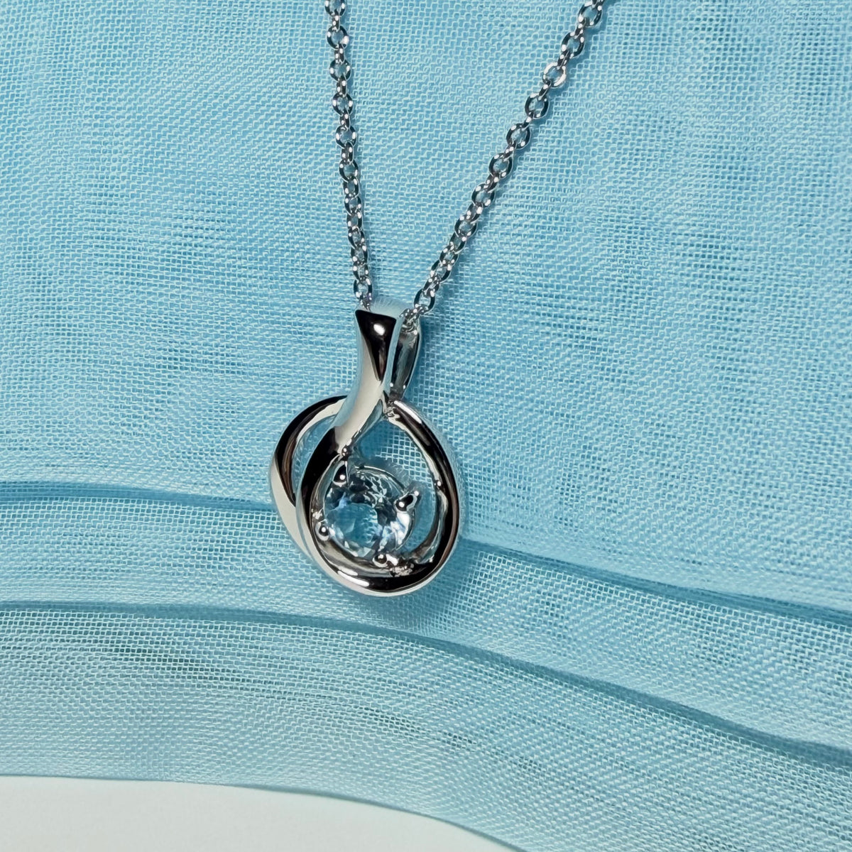 Real blue topaz necklace fancy round twisted swirl design