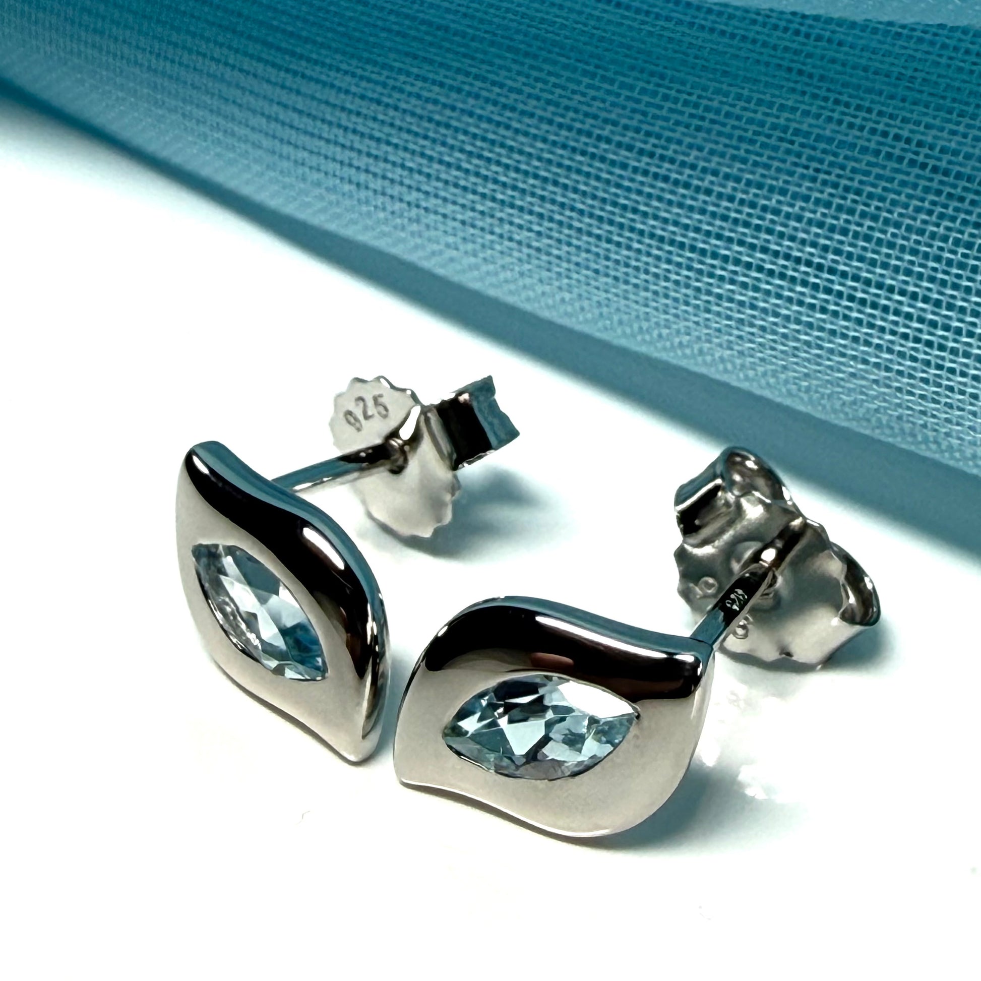 Real blue topaz petite pair of earrings fancy marquise shaped stones