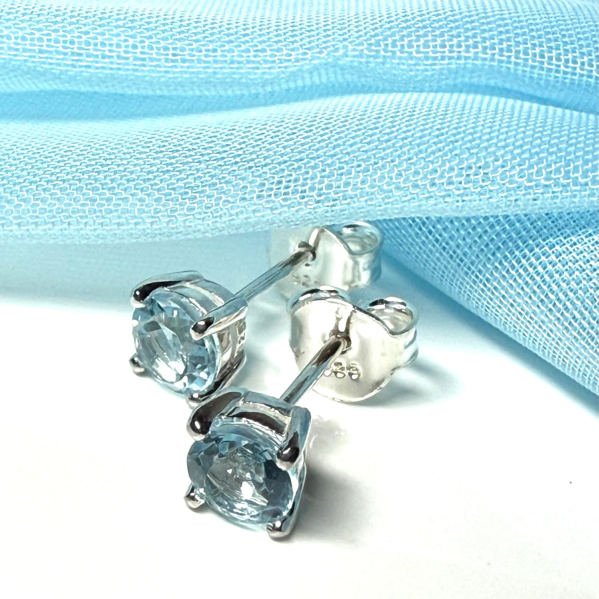Real blue topaz round stud earrings sterling silver claw setting