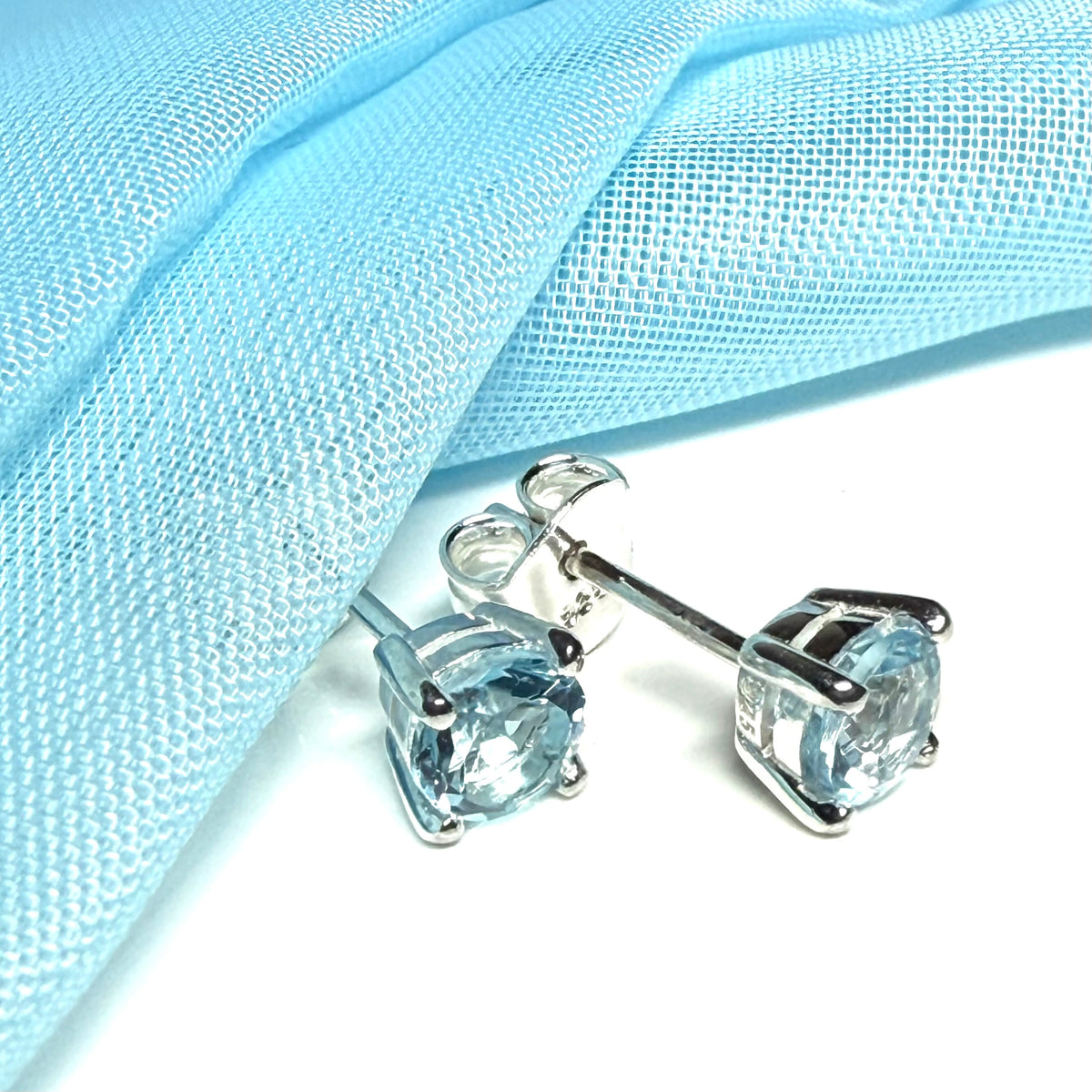 Real blue topaz round stud earrings sterling silver claw setting