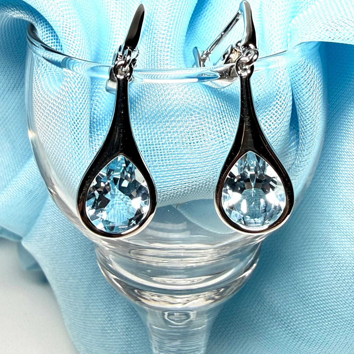 Real blue topaz sterling silver dropped earrings pear shaped stones