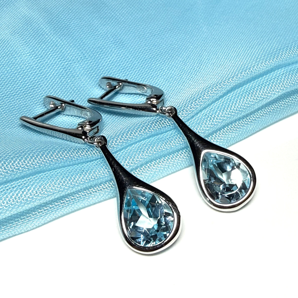 Real blue topaz sterling silver dropped earrings pear shaped stones