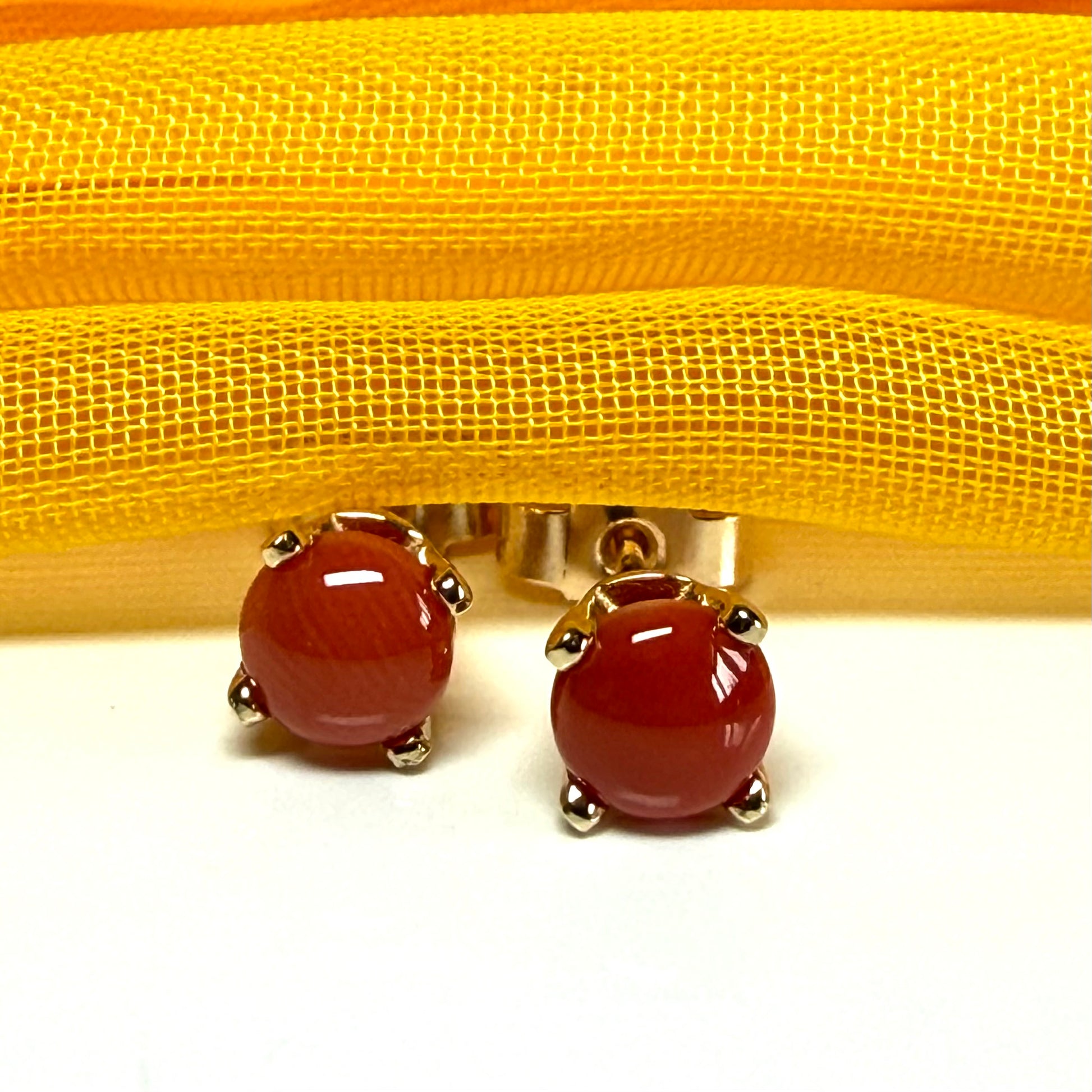 Real coral yellow gold round clawed set stud earrings