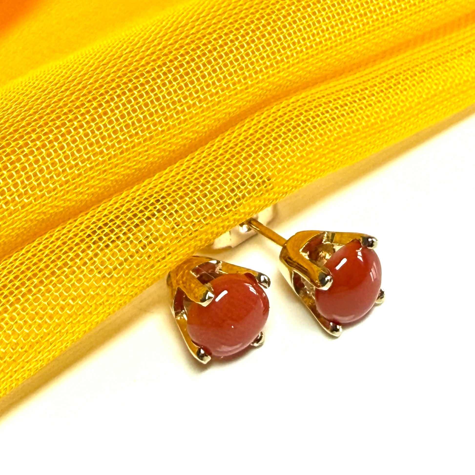 Real coral yellow gold round clawed set stud earrings
