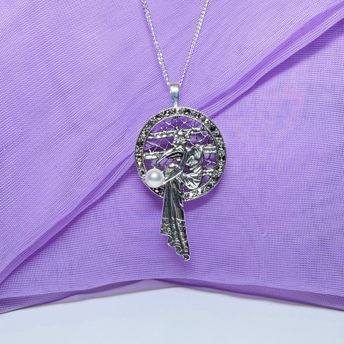 Real cultured freshwater pearl and real marcasite sterling silver necklace lady sitting
