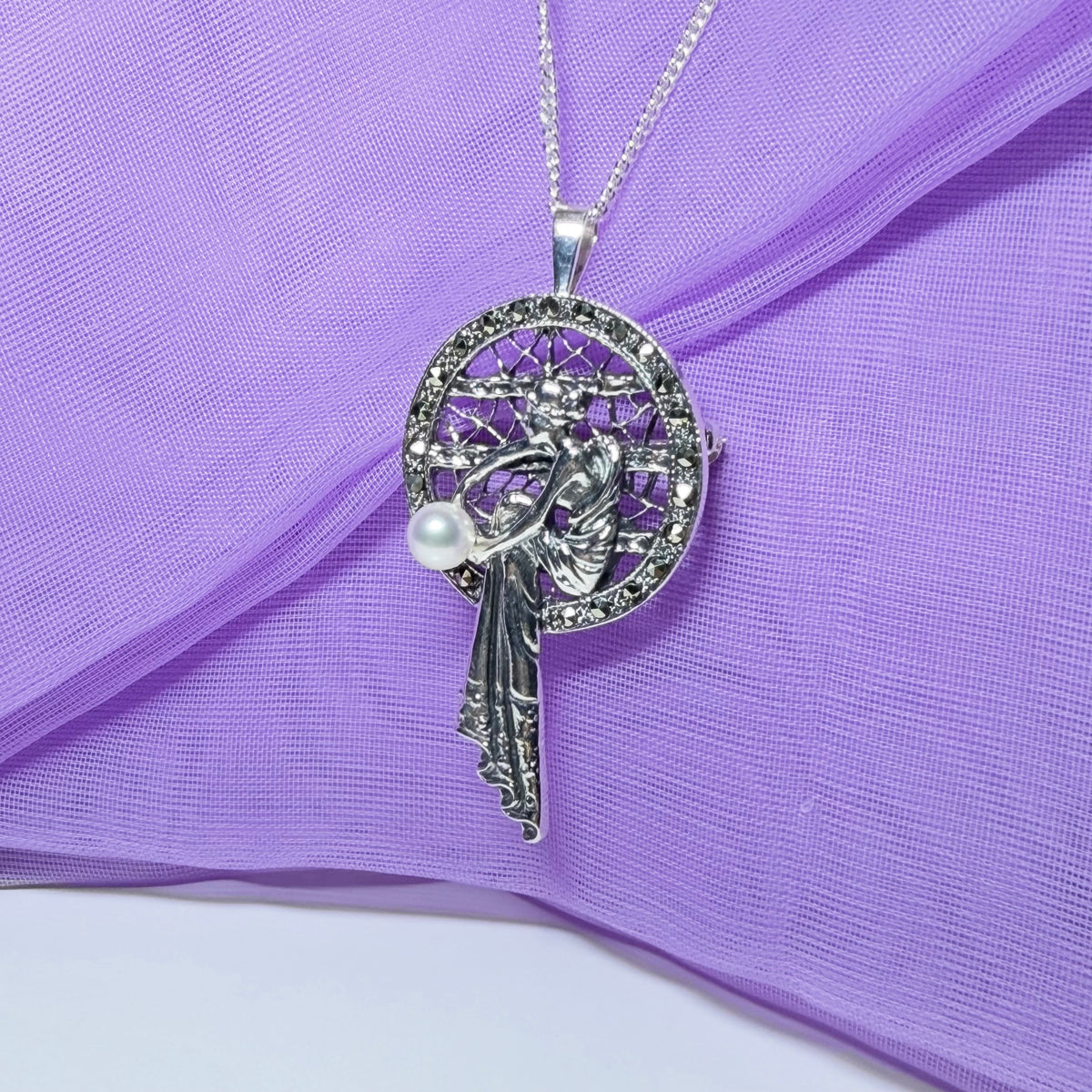 Real cultured freshwater pearl and real marcasite sterling silver necklace lady sitting