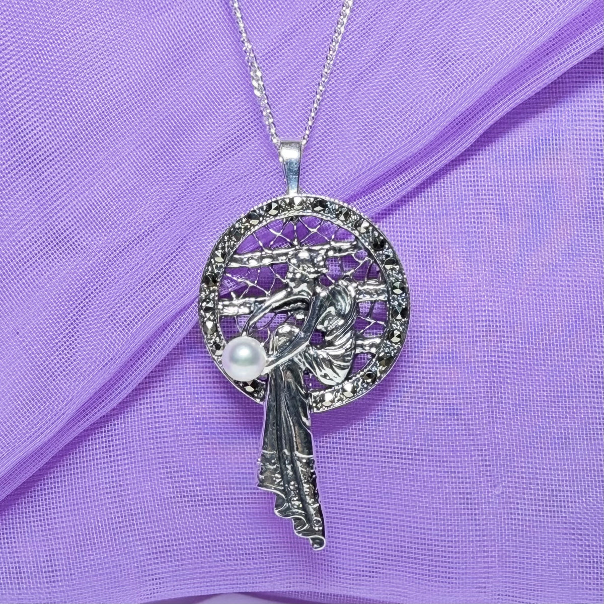 Real cultured freshwater pearl and real marcasite sterling silver necklace lady sitting