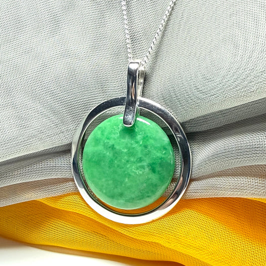 Real dark green jade necklace in a large round shape with a beautiful designed halo pendant with a chain included