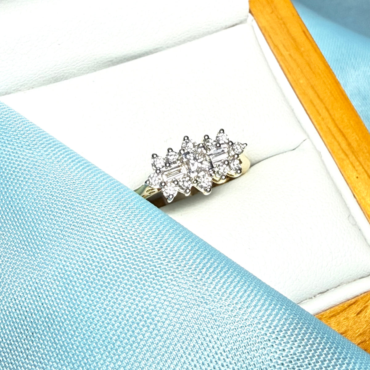 Real diamond cluster ring 18 carat yellow gold baguette and round cut