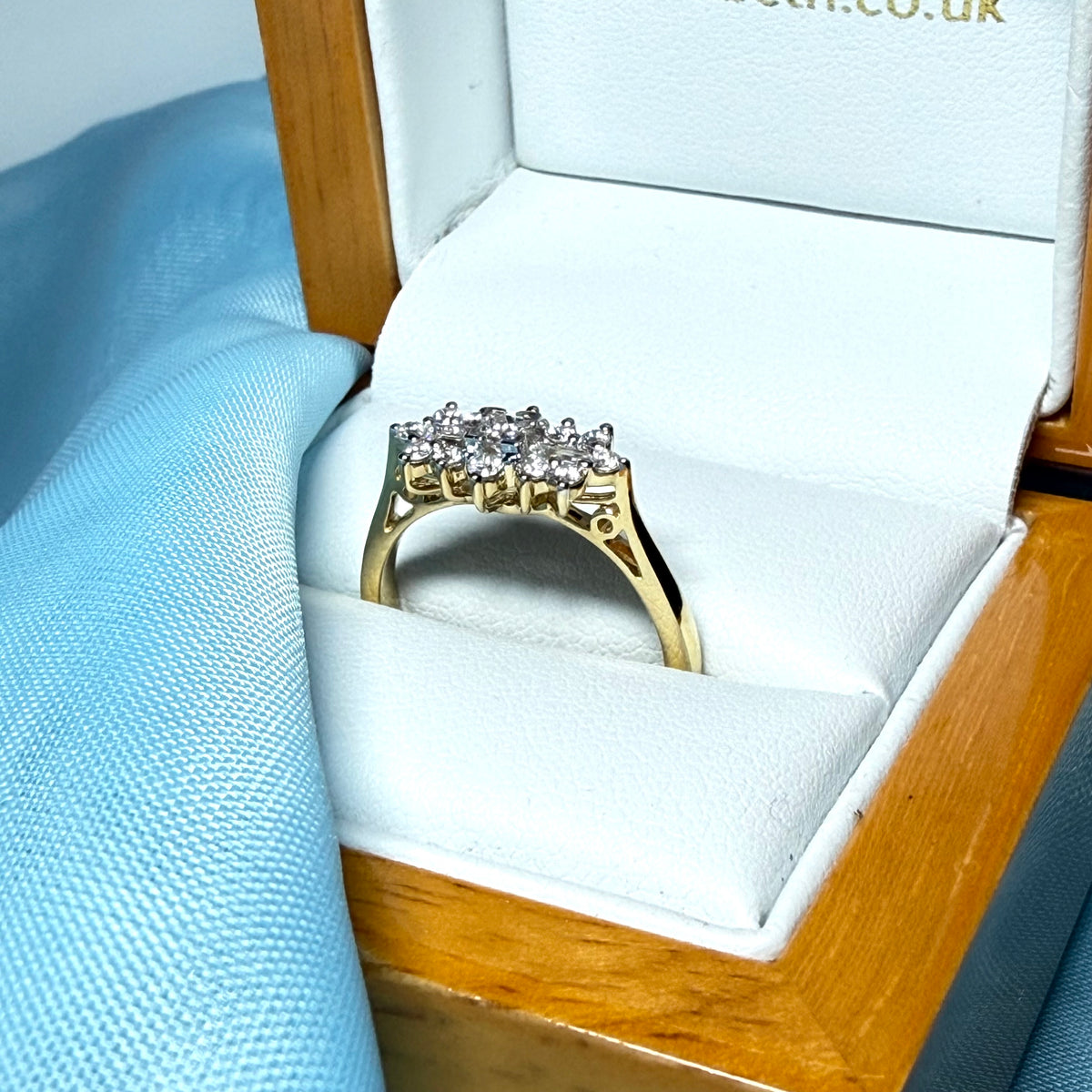 Real diamond cluster ring 18 carat yellow gold baguette and round cut