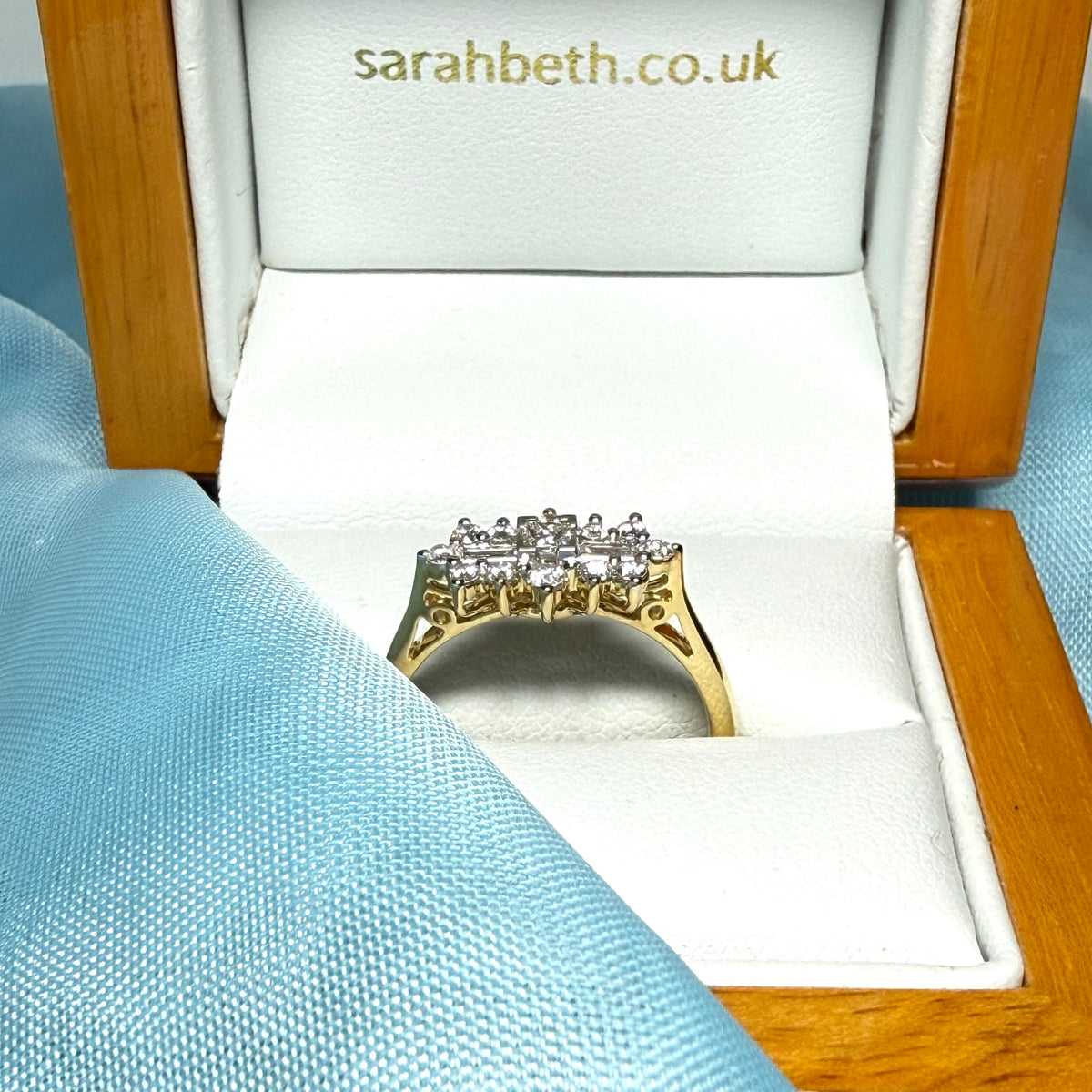 Real diamond cluster ring 18 carat yellow gold baguette and round cut