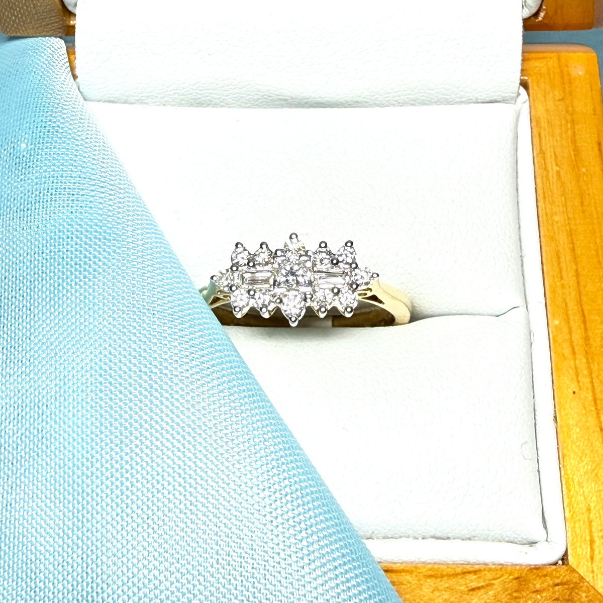 Real diamond cluster ring 18 carat yellow gold baguette and round cut