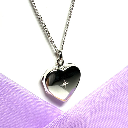 Real diamond heart shaped locket sterling silver including chain