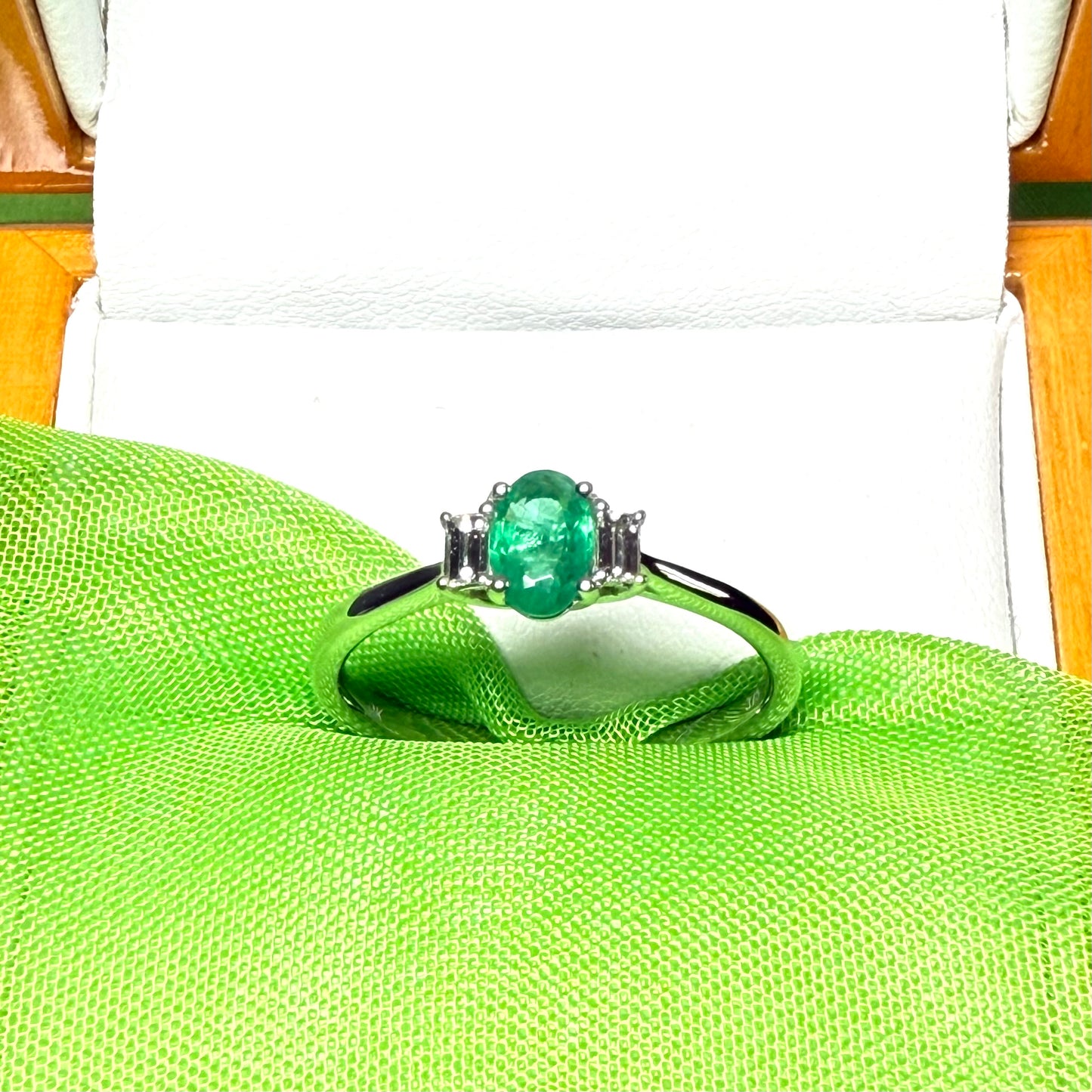 Real emerald and diamond three stone trilogy ring white gold
