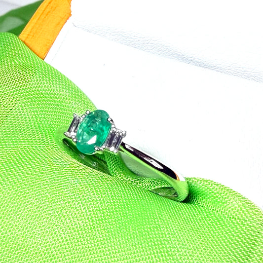 Real emerald and diamond three stone trilogy ring white gold