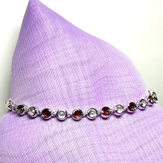 Real garnet and cubic zirconia round sterling silver bracelet