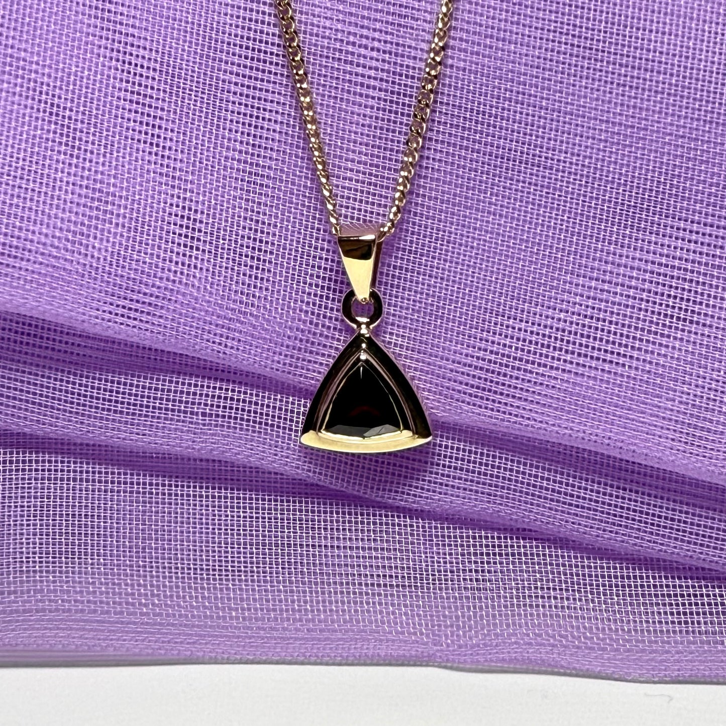 Real garnet necklace triangle shaped yellow gold pendant with a chain included