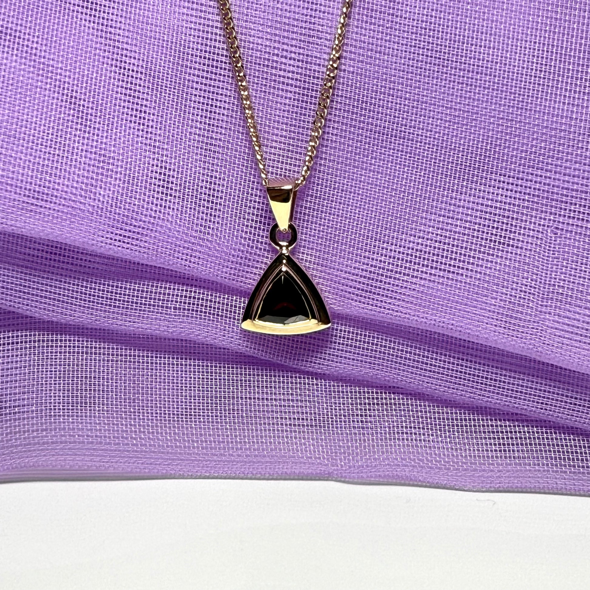Real garnet necklace triangle shaped yellow gold pendant with a chain included