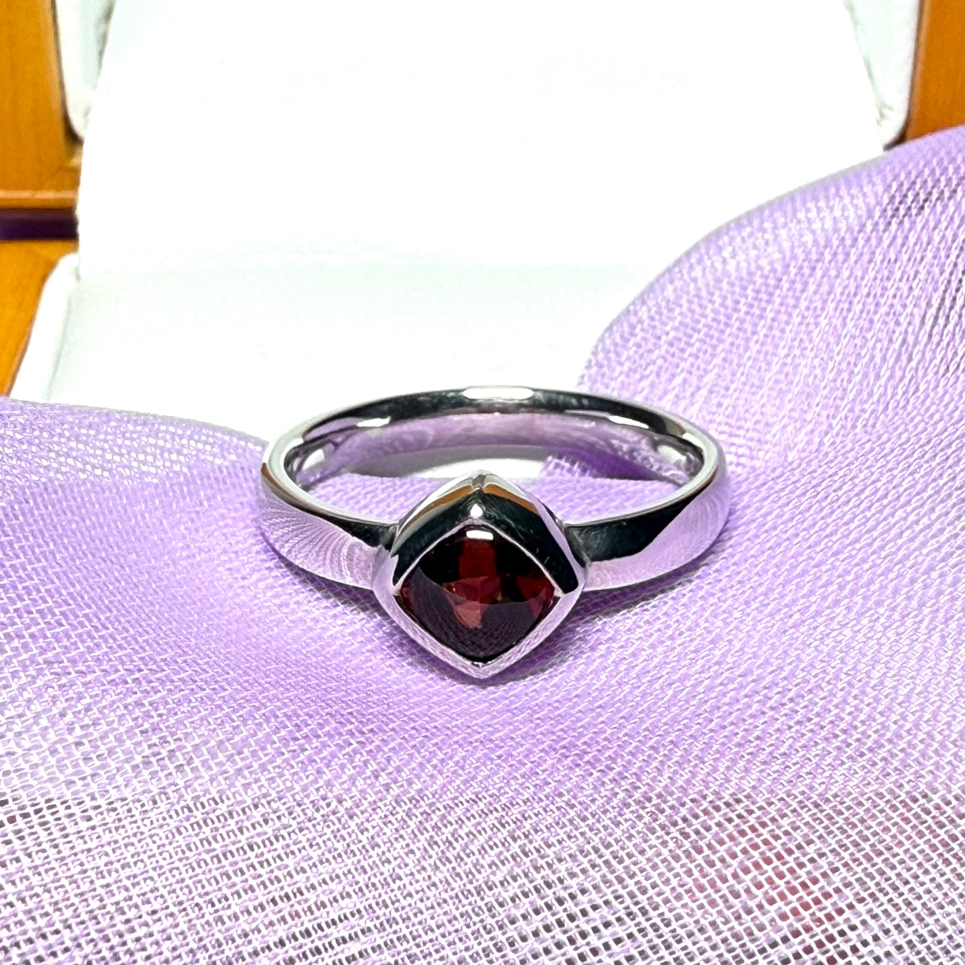 Real garnet ring white gold