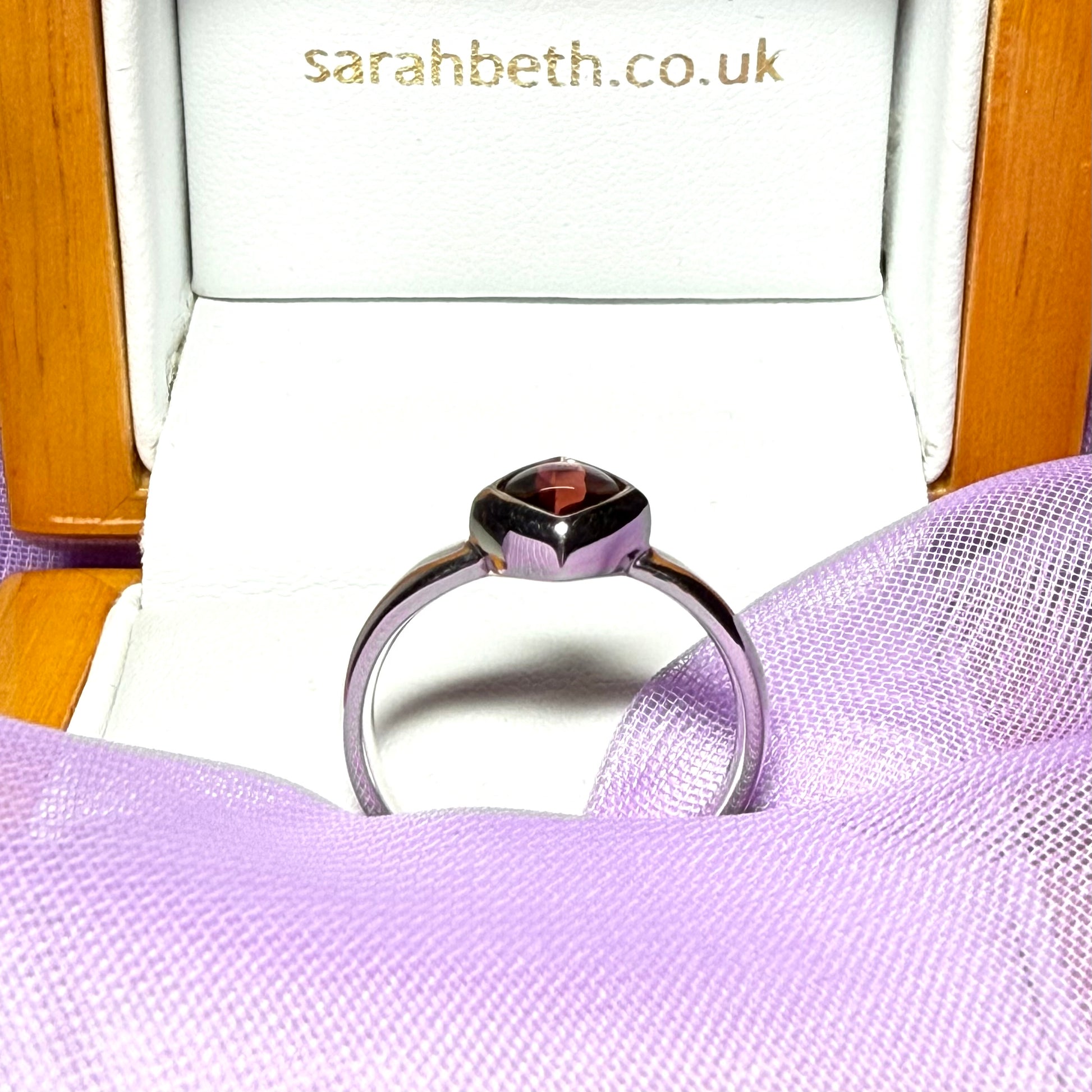Real garnet ring white gold