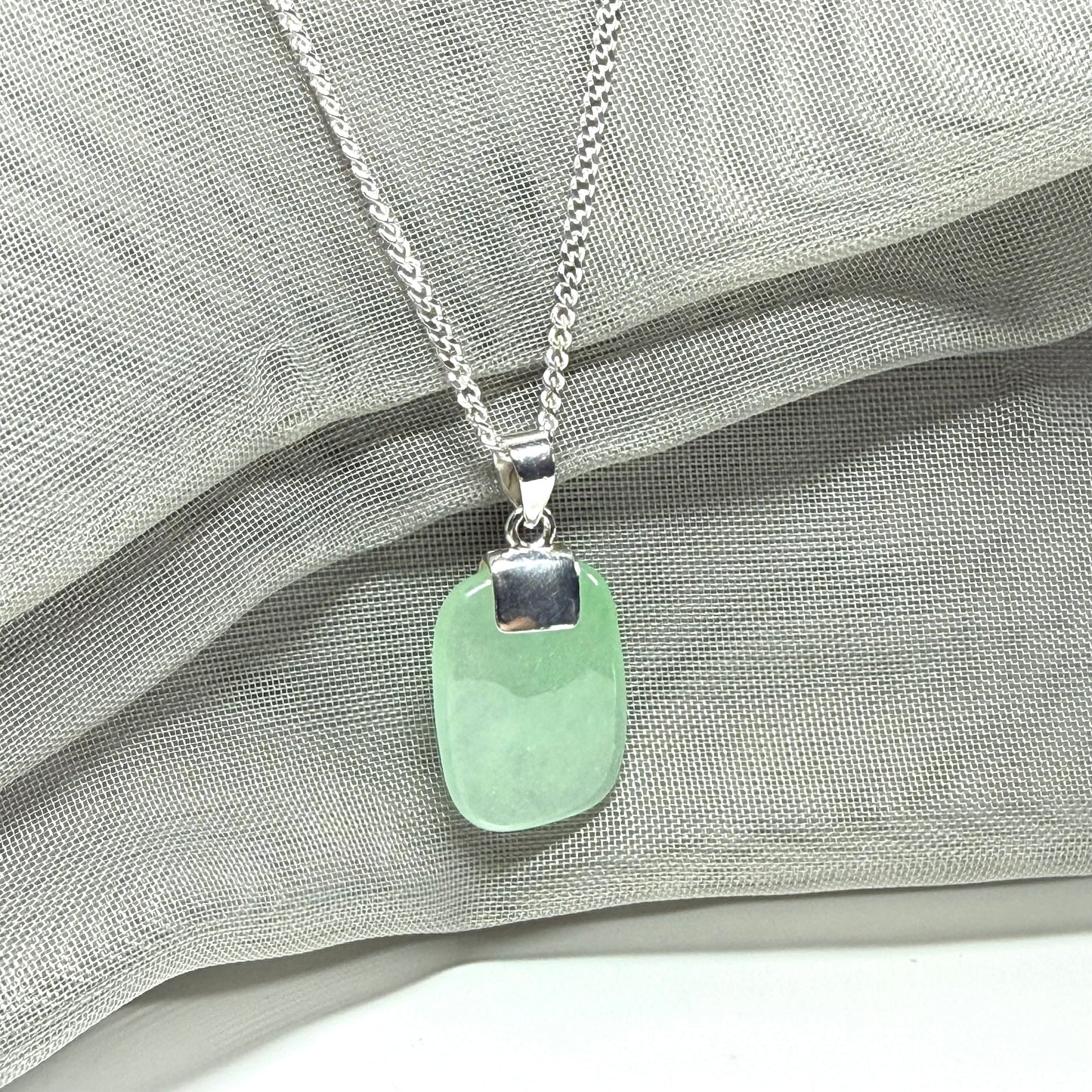 Real green jade necklace cushion shaped silver with a chain, stunning pendant