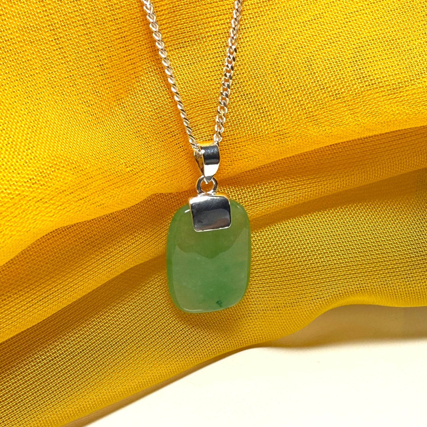 Real green jade necklace cushion shaped silver with a chain, truly stunning pendant