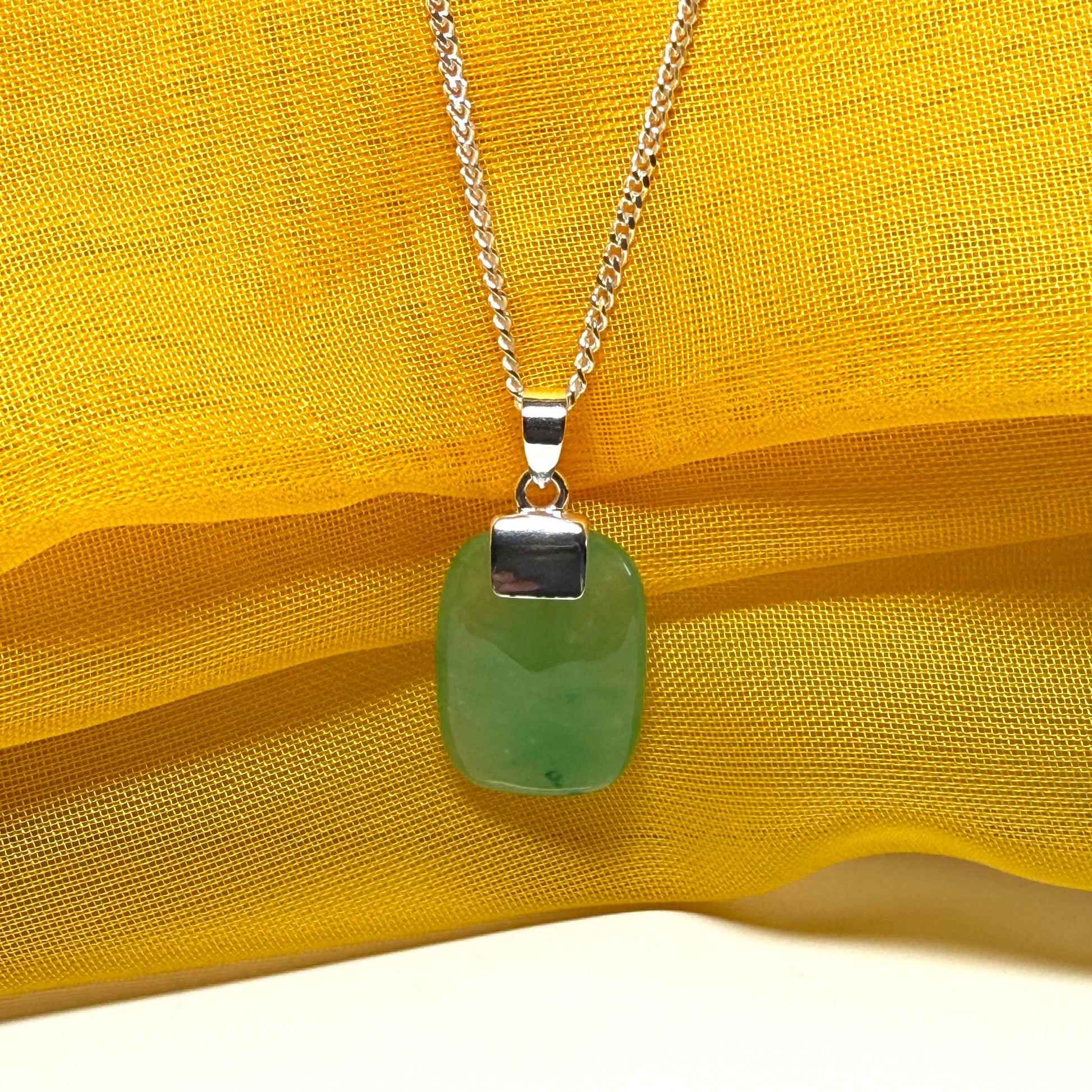 Real green jade necklace cushion shaped silver with a chain, truly stunning pendant