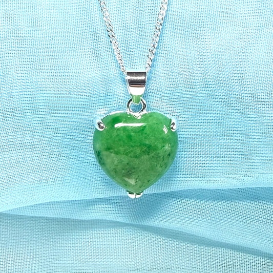 A real green jade necklace heart shape sterling silver with solid chain and box included as well