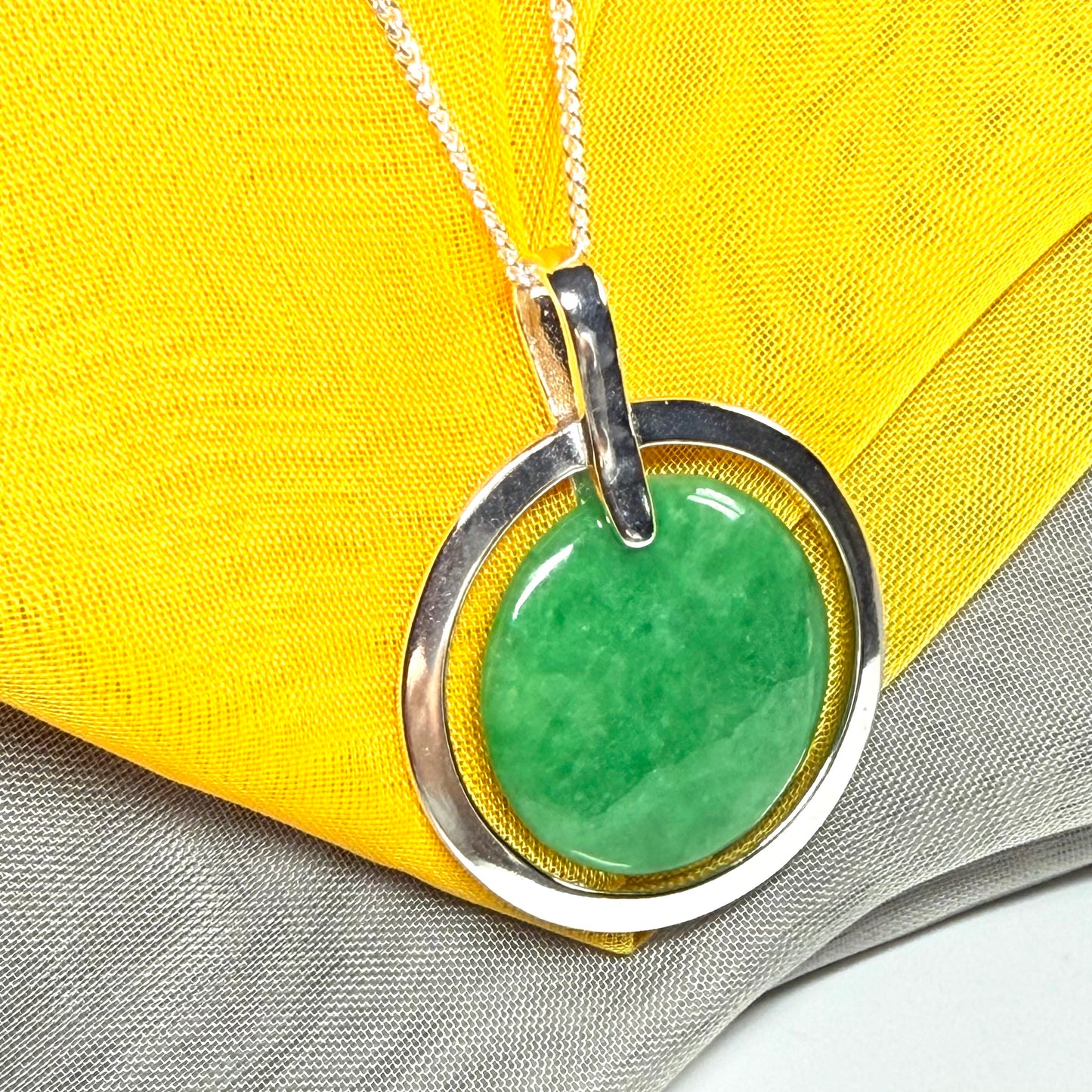 Real green jade necklace in a large round shape a stunning designed halo pendant, beautiful