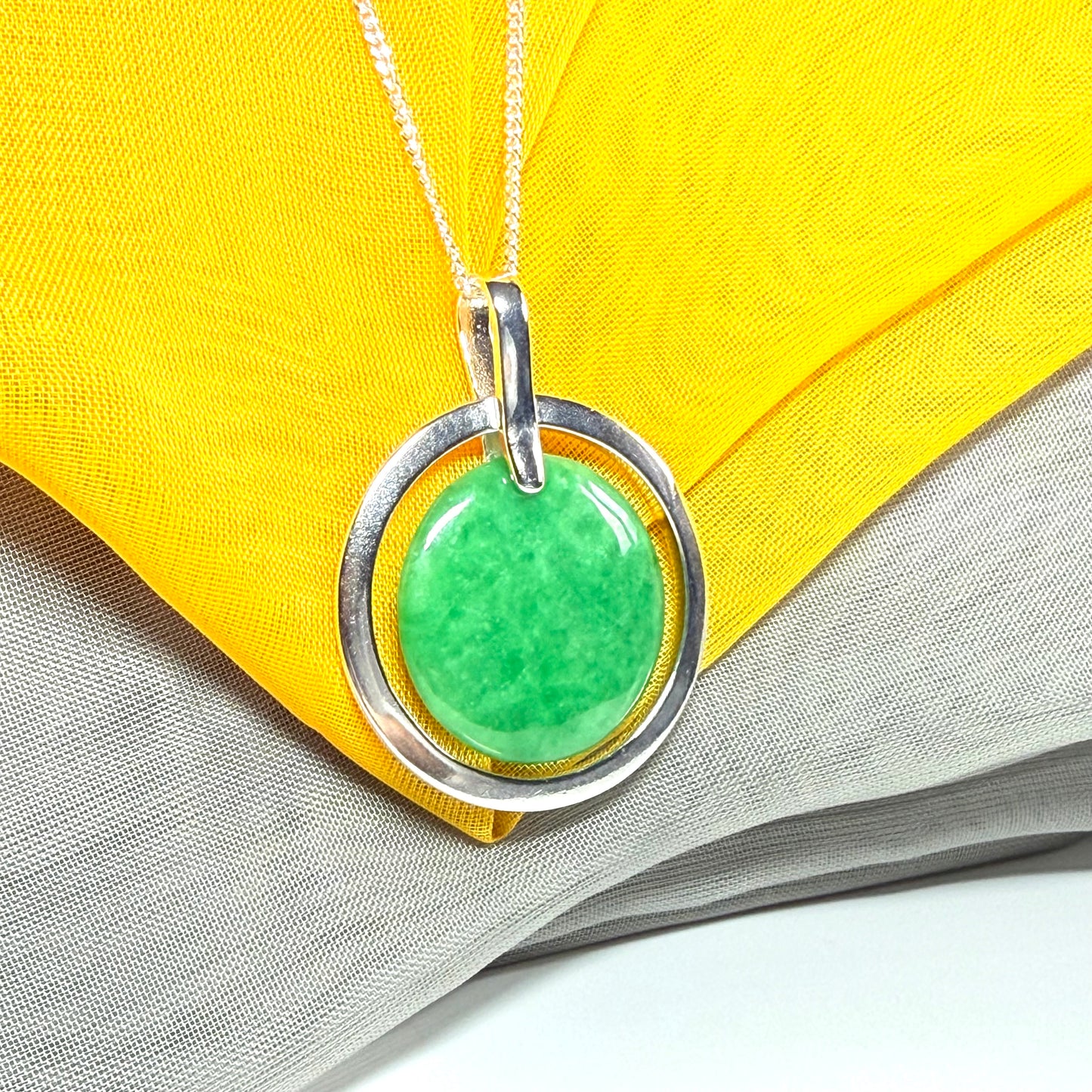 Real green jade necklace in a large round shape a stunning designed halo pendant, beautiful