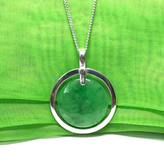 Real green jade necklace in a large round shape with a beautiful designed halo pendant with chain, whispers of green
