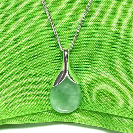 Real green jade necklace in a pear or tear drop shaped sterling silver pendant with chain