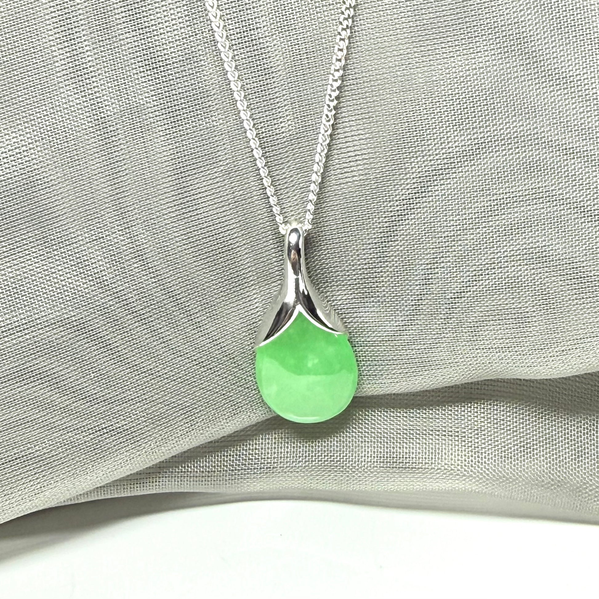 Real green jade necklace in a teardrop or pear shaped, a simply stunning pendant