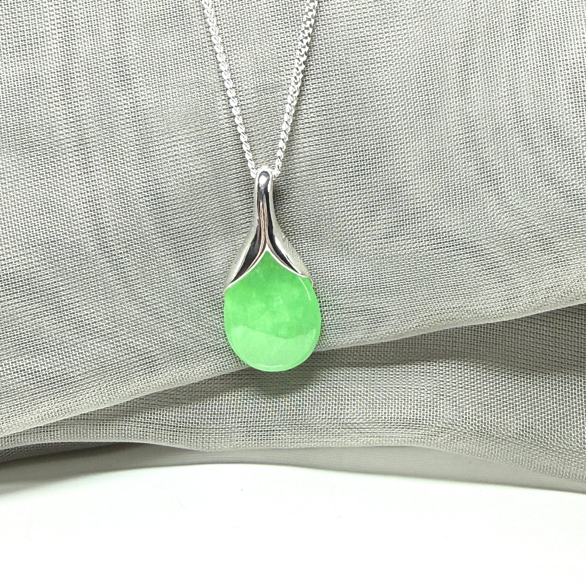 Real green jade necklace in a teardrop or pear shaped, a simply stunning pendant