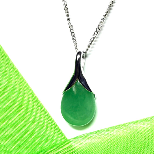 A real green jade necklace in a teardrop or pear shaped including a chain and a gift box