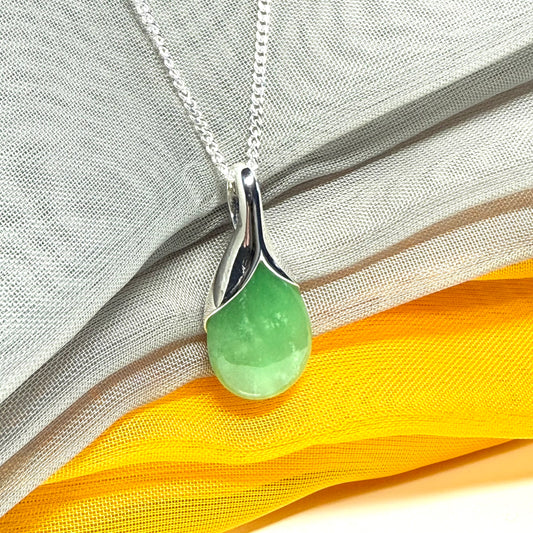 Real green jade necklace in a teardrop or pear shaped, simply stunning