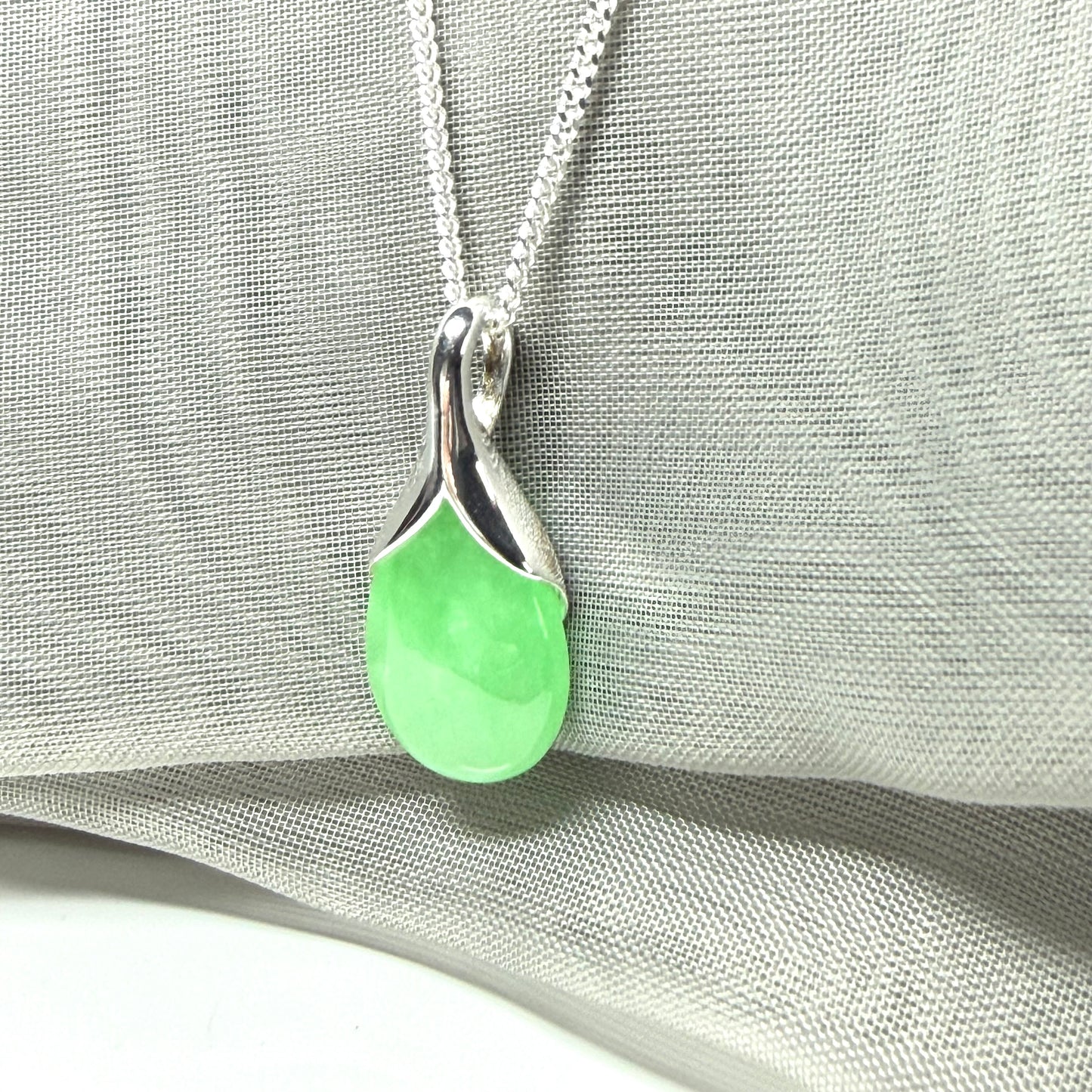 Real green jade necklace in a teardrop or pear shaped, a simply stunning pendant