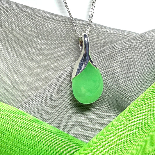 Real green jade necklace in a teardrop or pear shaped, timeless designed pendant with chain