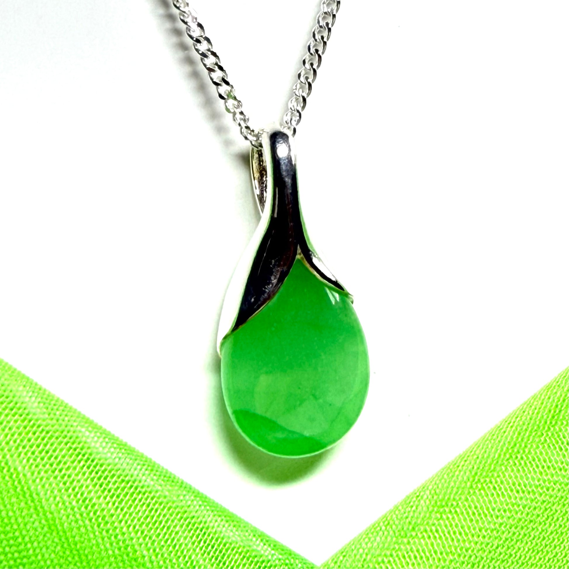 Real green jade necklace in a teardrop with pear shape, a timeless designed pendant with a chain included