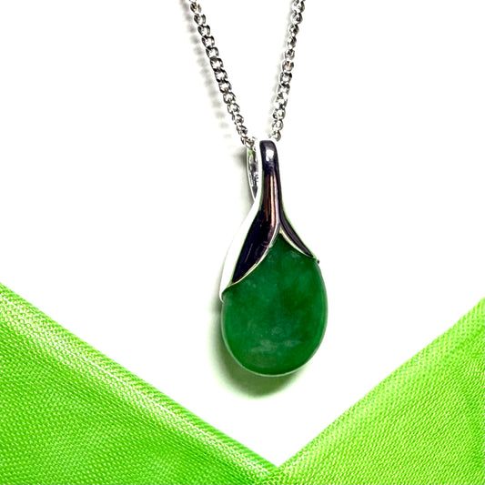 Real green jade necklace in a teardrop with pear shape, a timeless designed pendant with a chain