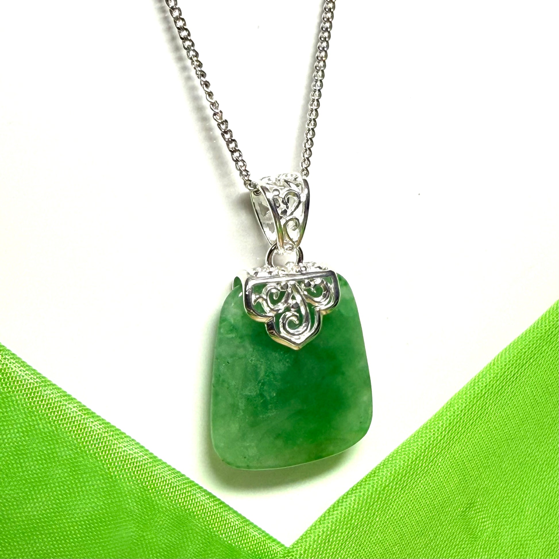 Real green jade necklace large cushion shaped including a solid silver curb chain included sterling silver