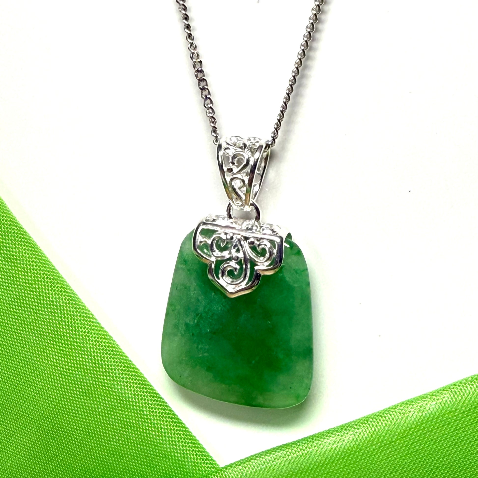Real green jade necklace large cushion shaped including a solid silver curb chain included sterling silver