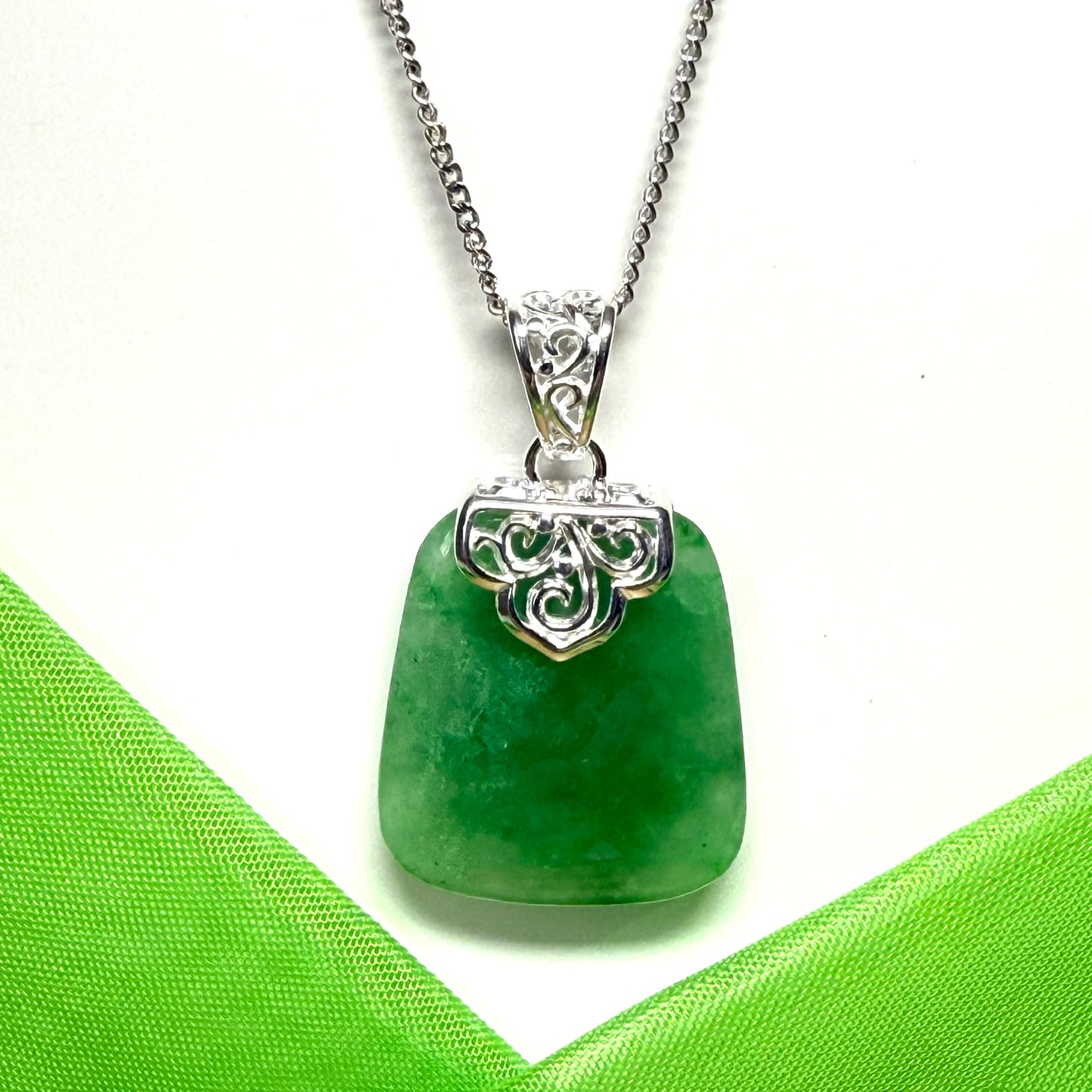 Real green jade necklace large cushion shaped including a solid silver curb chain included sterling silver