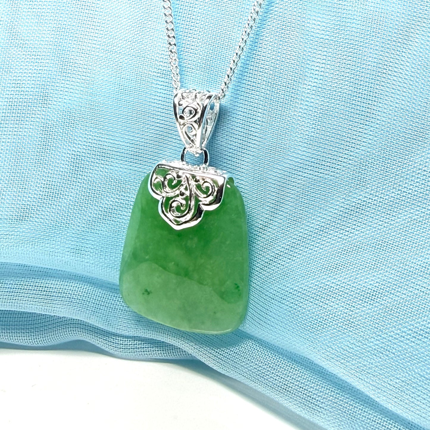 Real green jade necklace sterling silver large cushion shaped including a curb linked type chain