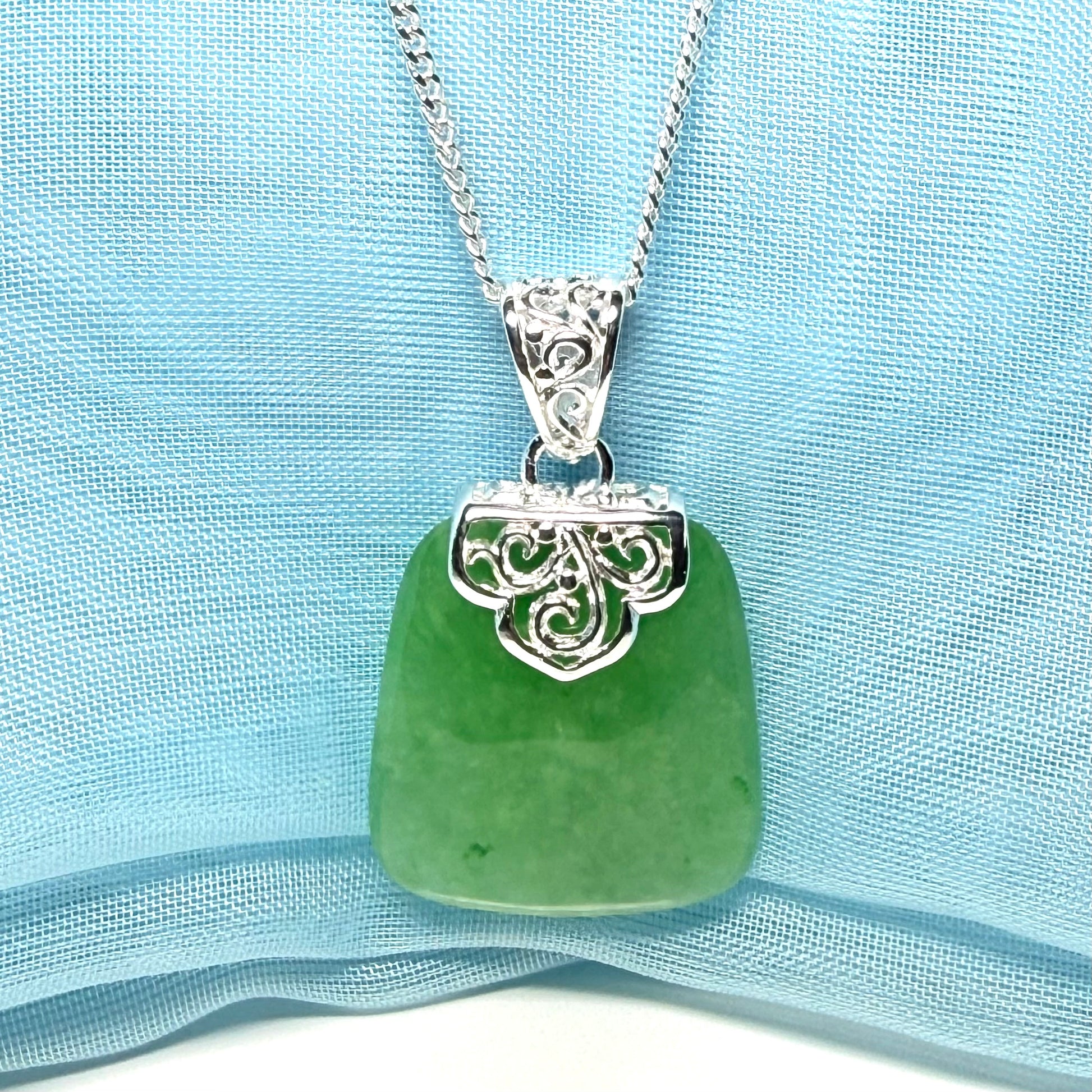 Real green jade necklace sterling silver large cushion shaped including a curb linked type chain