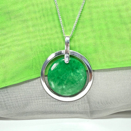 Real green jade necklace in a large round shape with a beautiful designed halo pendant with chain